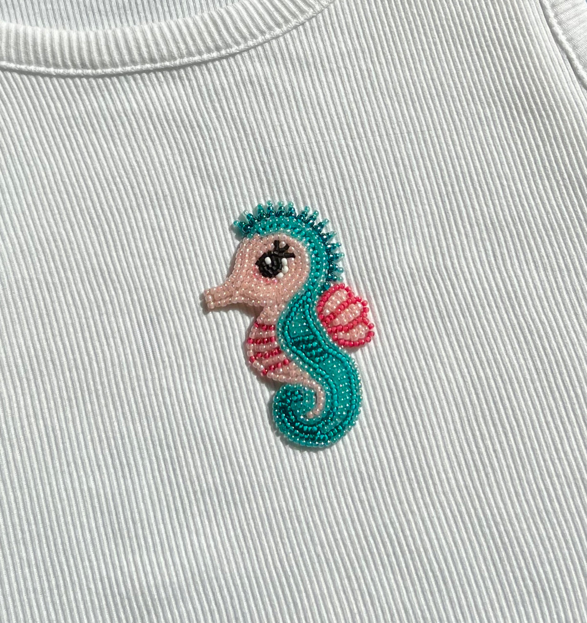 White Ribbed Top with Turquoise and Pink Beaded Seahorse