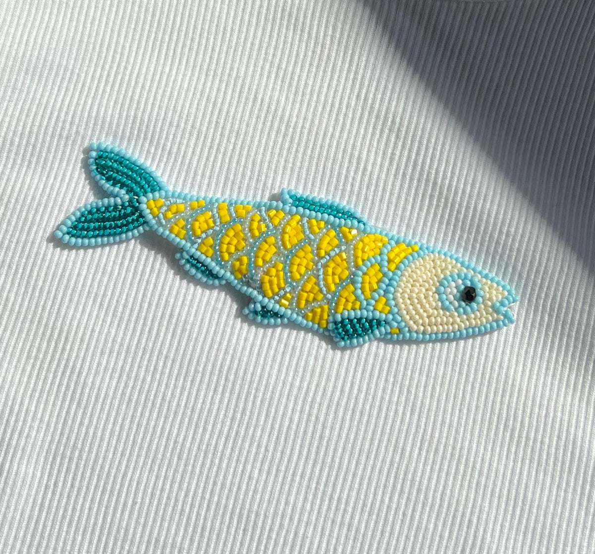 White Ribbed Top with Yellow and Turquoise Beaded Fish