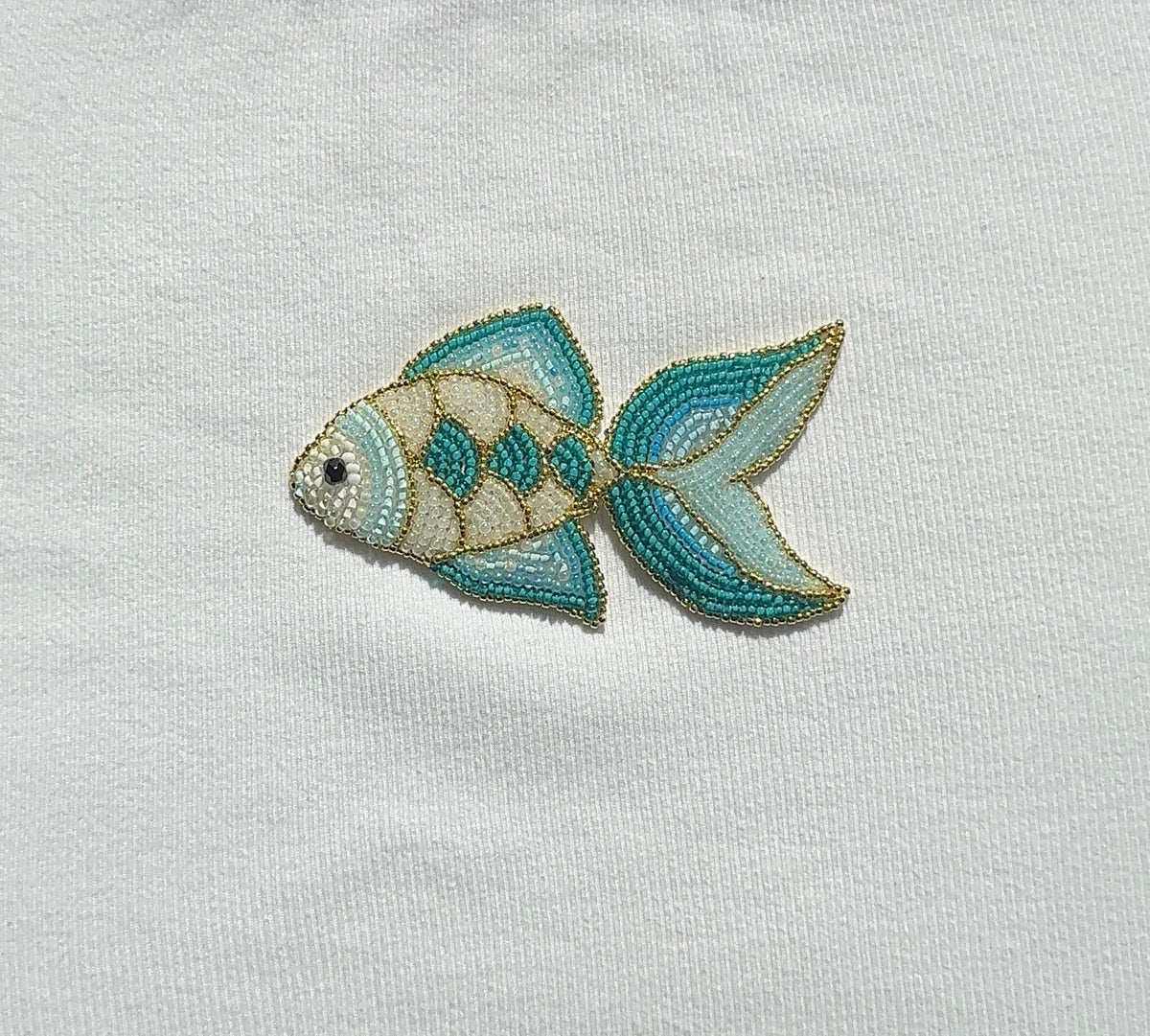 White Ribbed Top with Turquoise Fish Beadwork