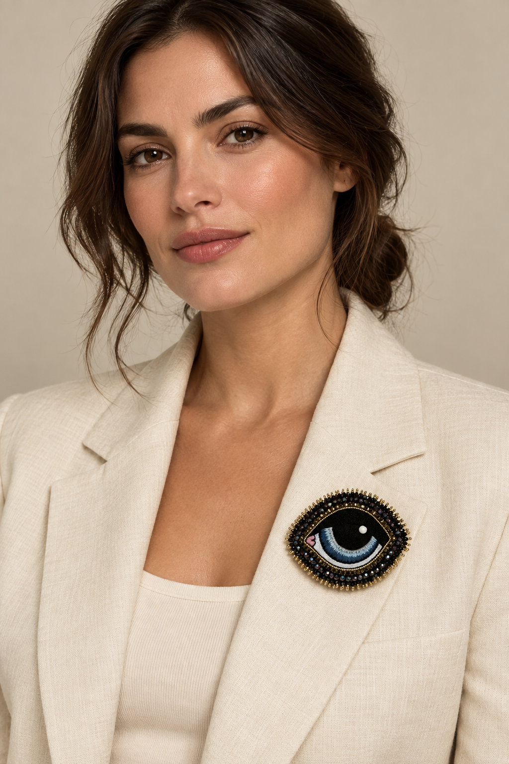 Galaxy brooch on ivory blazer